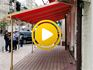 Видео - Ветроустойчивый тканевый навес для террасы кафе