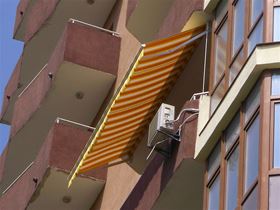 Сонцезахисна висувна маркіза на балкон Rodi